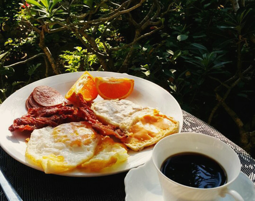 Coffee with bacon and eggs.