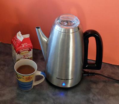 Making coffee with a stove top percolator