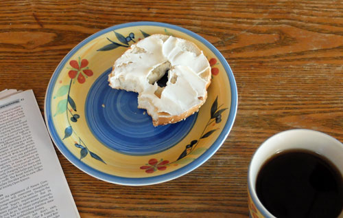Coffee and bagel for breakfast.