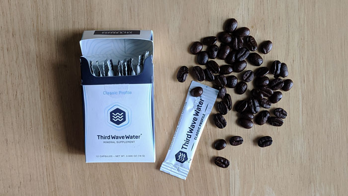 Third Wave Water package with coffee beans